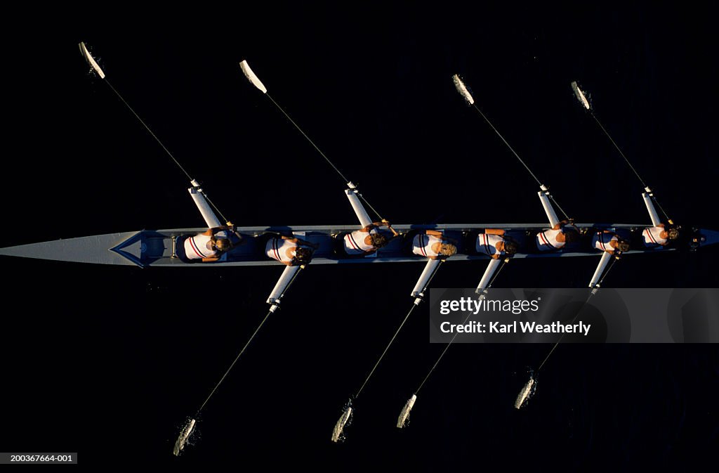 Overhead shot of woman's rowing team in practice