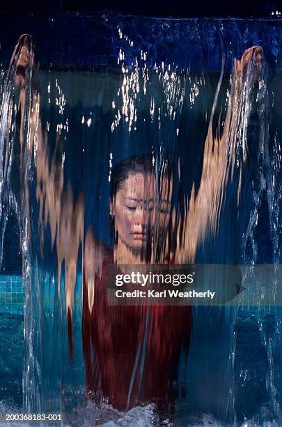 woman behind waterfall - behind waterfall stock-fotos und bilder