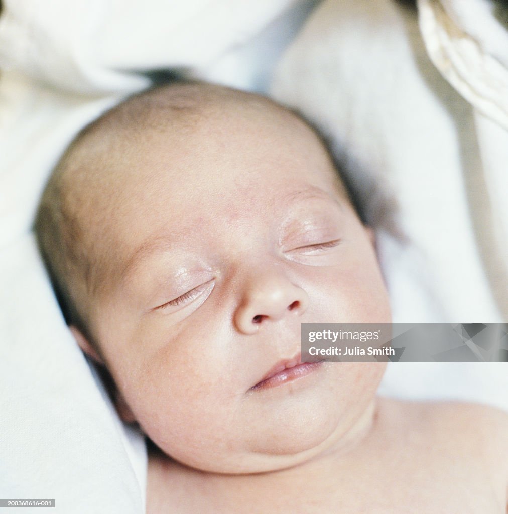 Newborn baby boy (0-3 months) sleeping