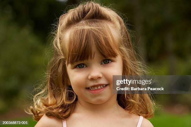 Girl Smiling Portrait High-Res Stock Photo - Getty Images