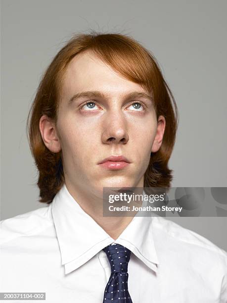 man wearing shirt and tie, looking up, close-up - boredom stock pictures, royalty-free photos & images