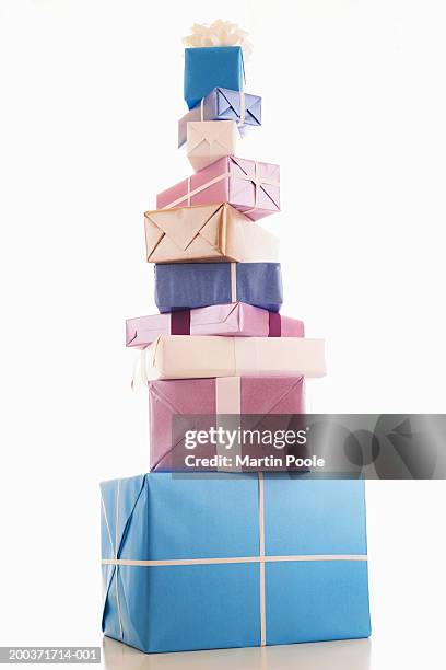 Pretty Present Stack Stack Of Presents On White Photos and Premium High Res Pictures - Getty ...