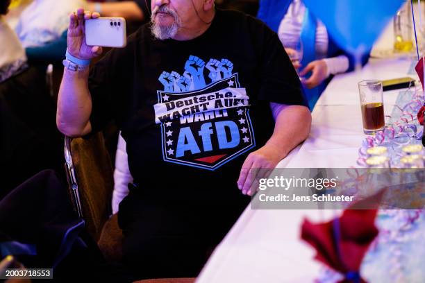 Party members and supporters of the far-right Alternative for Germany political party in the state of Thuringia during the traditional Ash Wednesday...