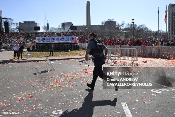 Police respond after shots were fired near the Kansas City Chiefs' Super Bowl LVIII victory parade on February 14 in Kansas City, Missouri.