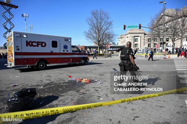 Police respond after shots were reportedly fired near the Kansas City Chiefs' Super Bowl LVIII victory parade on February 14 in Kansas City, Missouri.