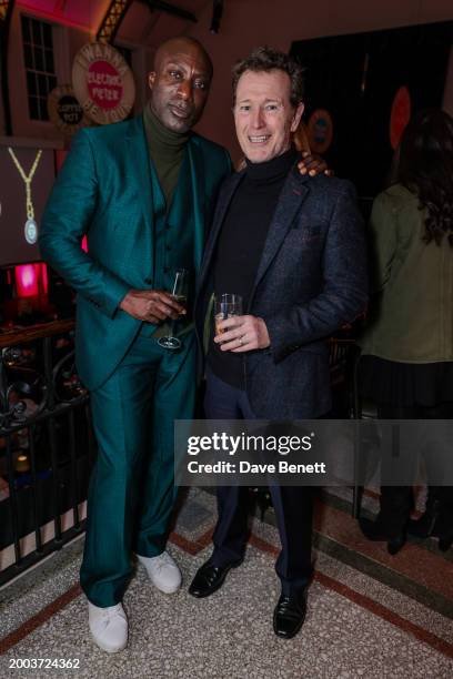 Sir Ozwald Boateng and Nick Moran attend the launch of the Stephen Webster x John Cooper Clarke "I Wanna Be Yours" collection at Ladbroke Hall on...