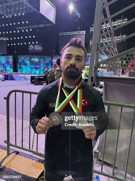 Turkish National Team Athlete Ferdi Hardal poses for a photo after winning silver and bronze medals in men's 67-kilogram category at the European...