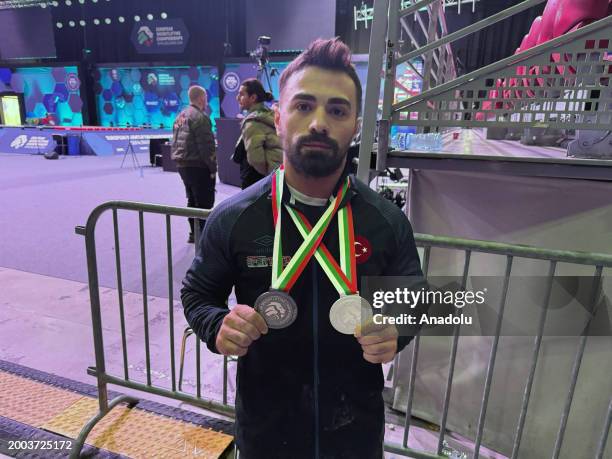 Turkish National Team Athlete Ferdi Hardal poses for a photo after winning silver and bronze medals in men's 67-kilogram category at the European...