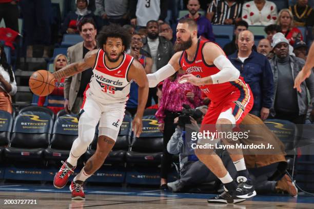 Marvin Bagley III of the Washington Wizards handles the ball during the game against the New Orleans Pelicans on February 14, 2024 at the Smoothie...