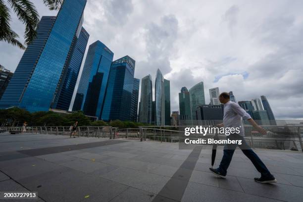Buildings in the central business district in Singapore, on Wednesday, Feb. 14, 2024. Singapore's economy expanded by a slightly more modest pace...