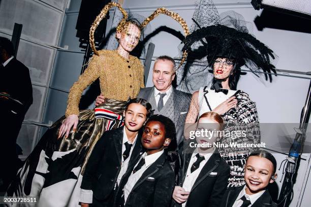 Designer Thom Browne, Alex Consani and models backstage at Thom Browne RTW Fall 2024 as part of New York Ready to Wear Fashion Week held at The Shed...