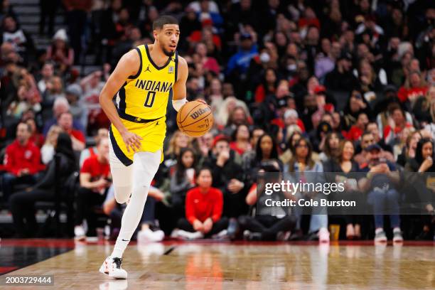 Tyrese Haliburton of the Indiana Pacers dribbles in the first half of their NBA game against the Toronto Raptors at Scotiabank Arena on February 14,...