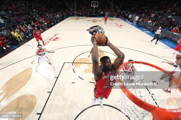 Zion Williamson of the New Orleans Pelicans drives to the basket during the game against the Washington Wizards on February 14, 2024 at the Smoothie...