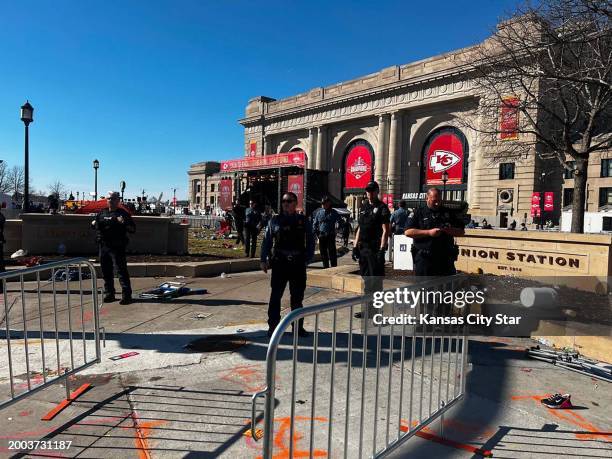 Kansas City police are seen at Union Station, where a shooting broke out during the Chiefs' Super Bowl victory rally on Wednesday, Feb. 14 in Kansas...