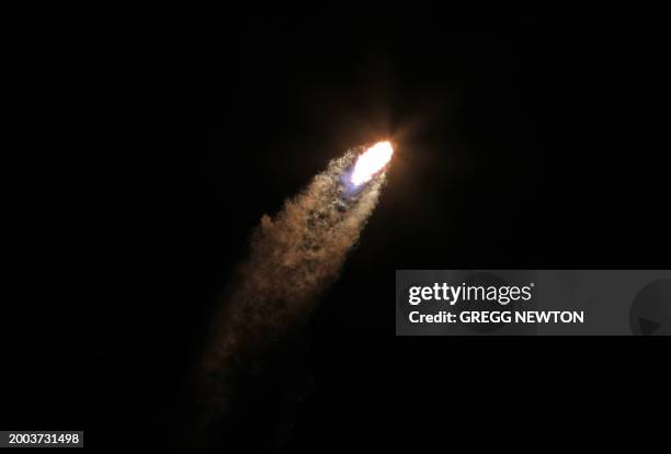 SpaceX Falcon 9 rocket soars into orbit from the Kennedy Space Center on the Intuitive Machines' Nova-C moon lander mission, in Cape Canaveral,...