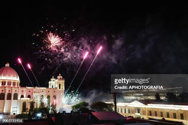 Fireworks explode during the Chinese New Year celebration outside the El Salvador National Library on February 14, 2024 in San Salvador, El Salvador.
