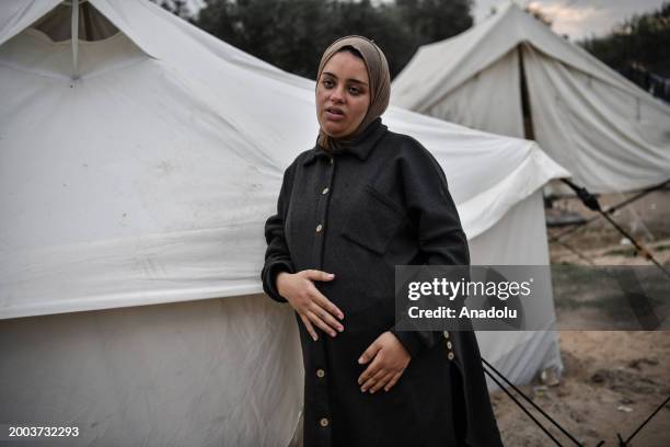 Year-old Rua al-Sindavi, a Palestinian pregnant with triplets expects to give birth in a tent due to insufficient medical facilities, and had to...