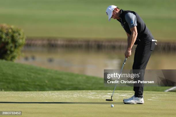 Jordan Spieth of the United States putts on the 12th green during the final round of the WM Phoenix Open at TPC Scottsdale on February 11, 2024 in...