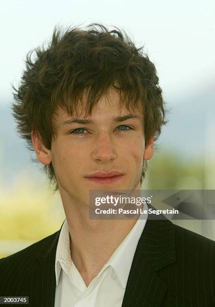 Actor Gaspard Ulliel poses for the cameras during a photocall for the film "Les Egares" at the Palais des Festivals during the 56th International...