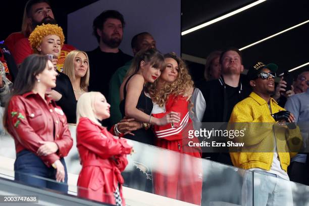 Rapper Ice Spice, Singer Taylor Swift and Actress Blake Lively hug prior to Super Bowl LVIII between the San Francisco 49ers and Kansas City Chiefs...
