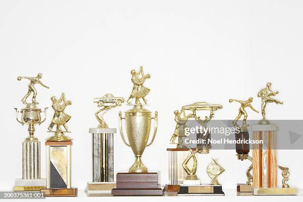 assorted trophies - award white background stockfoto's en -beelden