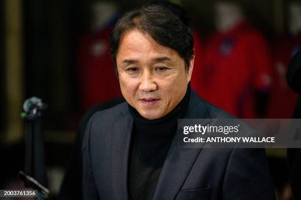 Hwangbo Kwan of the Korea Football Association's national team committee leaves at the end of a press briefing at the Korea Football Association in...