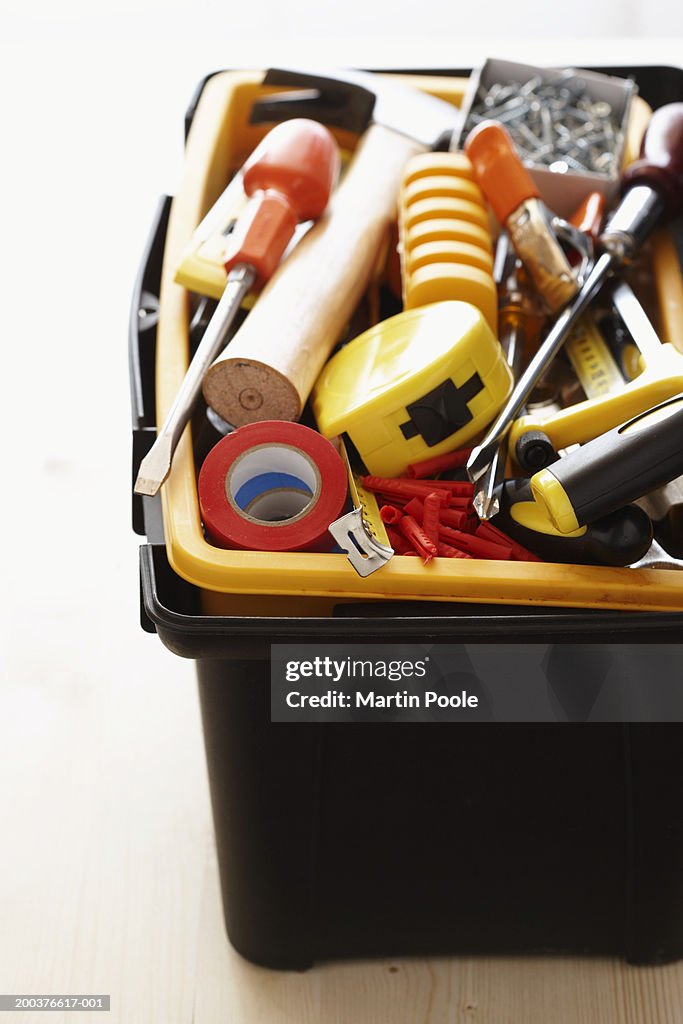 Toolbox on wooden surface,  close-up