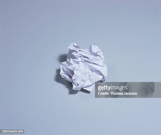 crumpled sheet of white paper - crumpled paper stockfoto's en -beelden
