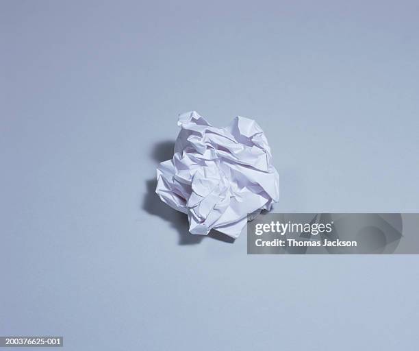 crumpled sheet of white paper - paper ball stock pictures, royalty-free photos & images