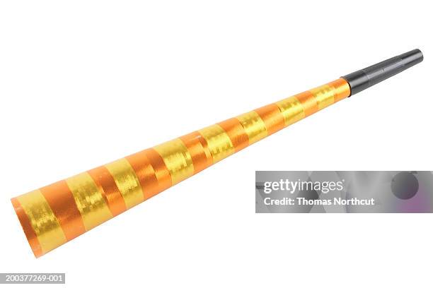 party horn blower, elevated view - party blower stock pictures, royalty-free photos & images