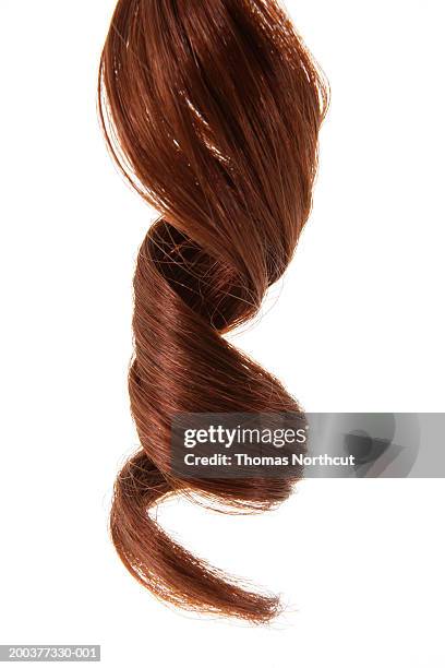 curly hair, close-up of ringlet - silky brown hair stock pictures, royalty-free photos & images