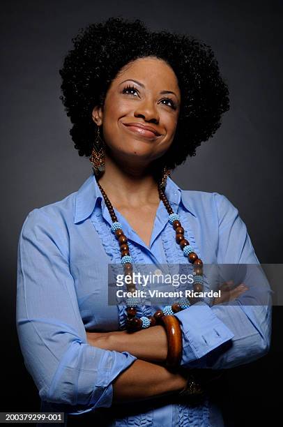 young woman smiling, close-up - blue blouse - fotografias e filmes do acervo