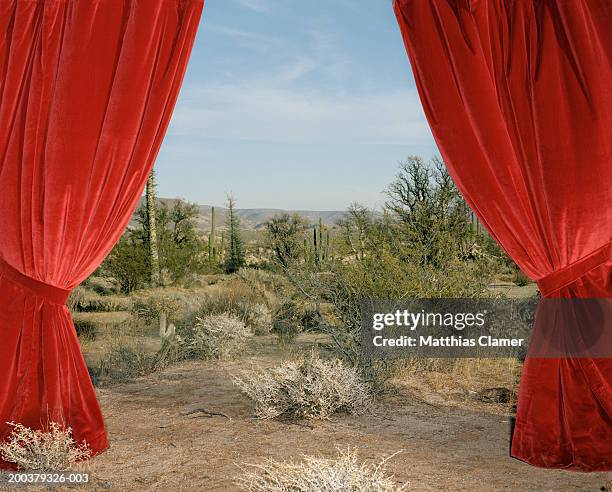 red curtain in desert - opening the curtains stock pictures, royalty-free photos & images