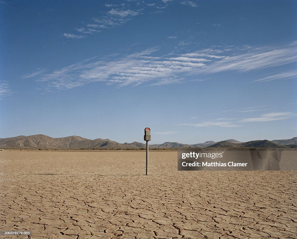 Expired parking meter in desert