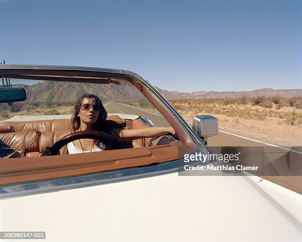 young woman driving convertible, close-up - mexico stock pictures, royalty-free photos & images