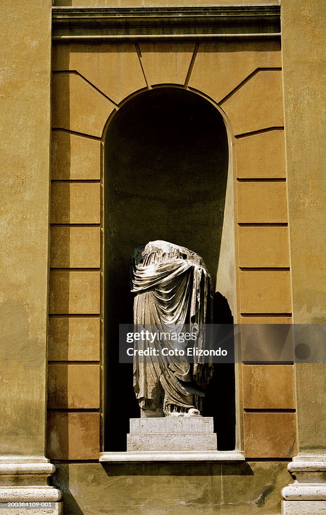 Headless classical statue