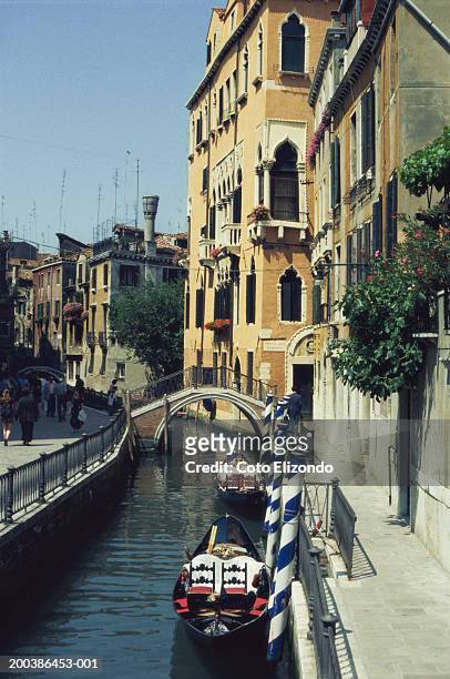 italy, venice, gondolas parked in canal - 1996 stock pictures, royalty-free photos & images