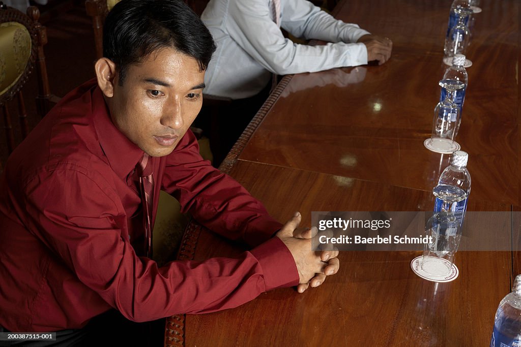 Businessman sitting at table