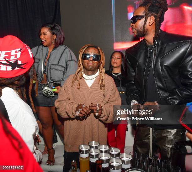 Reginae Carter, Lil Wayne and 2 Chainz attend Big Game Weekend Saturday at Sahara Las Vegas on February 10, 2024 in Las Vegas, Nevada.