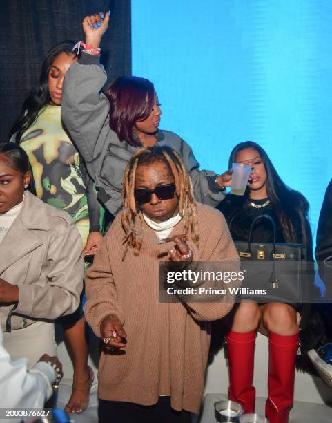 Reginae Carter and Lil Wayne attend Big Game Weekend Saturday at Sahara Las Vegas on February 10, 2024 in Las Vegas, Nevada.