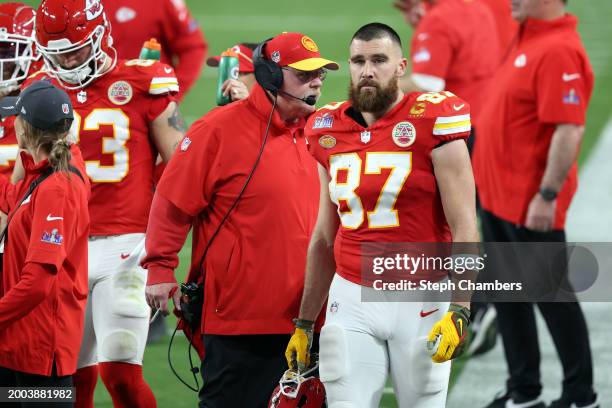 Travis Kelce and Head coach Andy Reid of the Kansas City Chiefs look on in the second quarter against the San Francisco 49ers during Super Bowl LVIII...