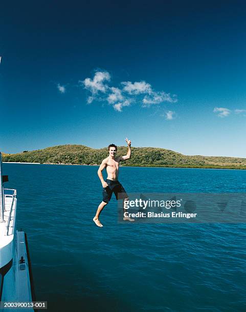 Man Stopping Wave Photos and Premium High Res Pictures - Getty Images