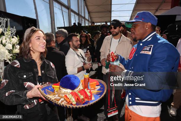 Kelsey Murphy and DeAndre Carter attend The Players Tailgate hosted by Bobby Flay presented by Bullseye Event Group for Super 58 on February 11, 2024...