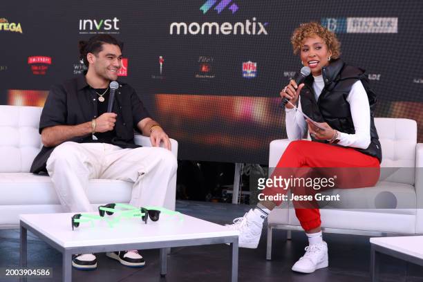 Puka Nacua and Sage Steele speak onstage during The Players Tailgate hosted by Bobby Flay presented by Bullseye Event Group for Super 58 on February...