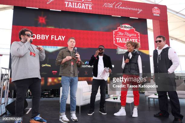 Aaron May, Bobby Flay, DJ Irie, Sage Steele, and Kyle Kinnett speak onstage during The Players Tailgate hosted by Bobby Flay presented by Bullseye...