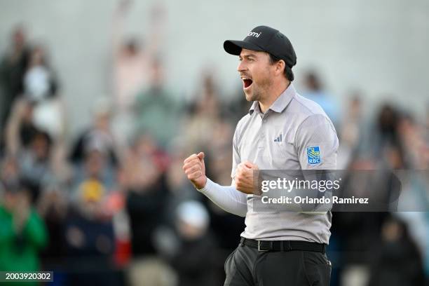 Nick Taylor of Canada celebrates making his birdie putt to win on the second-playoff hole against Charley Hoffman of the United States during the...