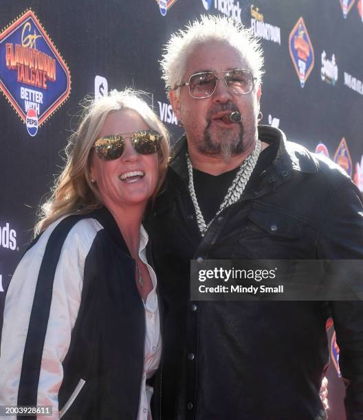 Lori Fieri and Guy Fieri arrive at Guy Fieri's Flavortown Tailgate on February 11, 2024 in Las Vegas, Nevada.