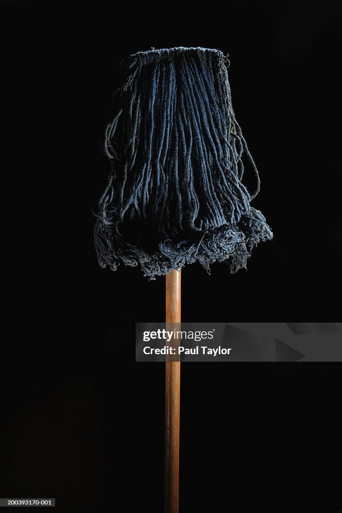 Mop Against Black Background High-Res Stock Photo - Getty Images