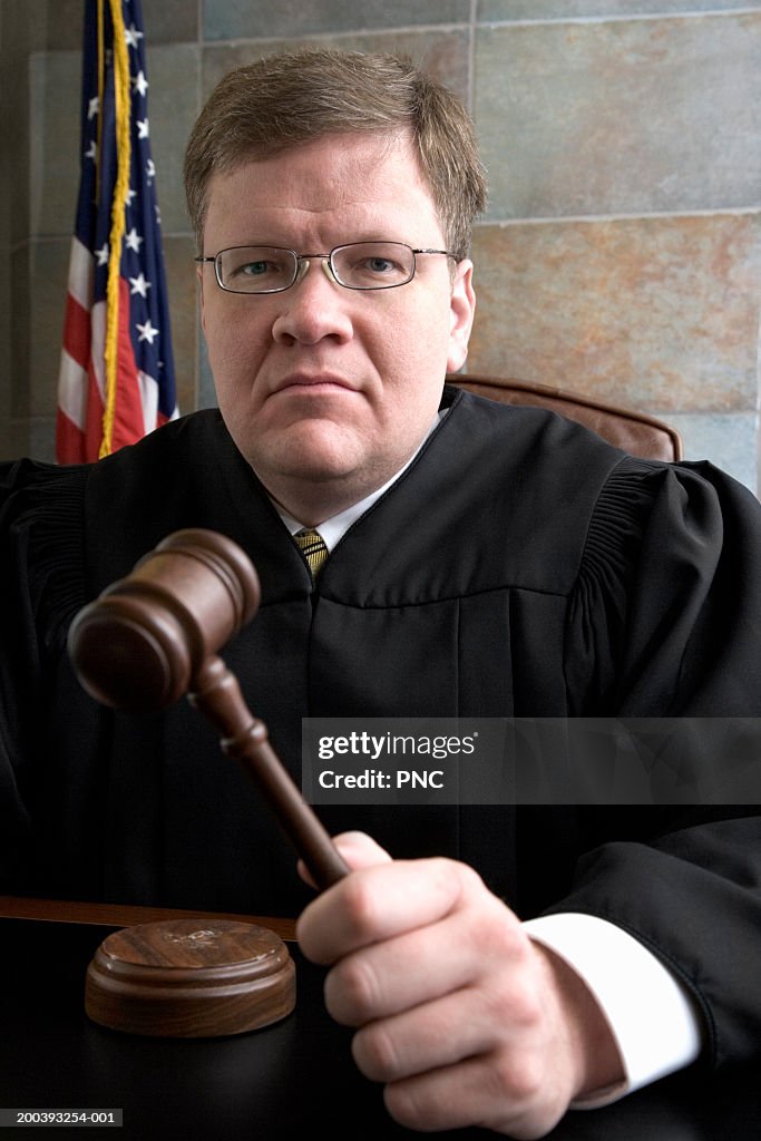 Judge with gavel, portrait