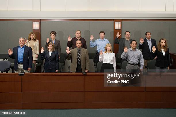 jury standing, being sworn in - jury stock pictures, royalty-free photos & images